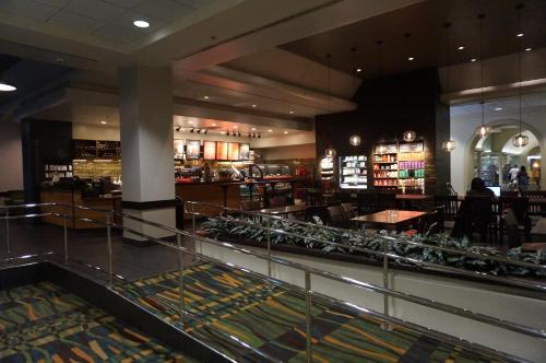 a lobby of a hotel with a library at LSI Resorts at Ala Moana in Honolulu