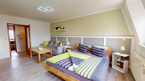 Katil atau katil-katil dalam bilik di Apartments am Sund