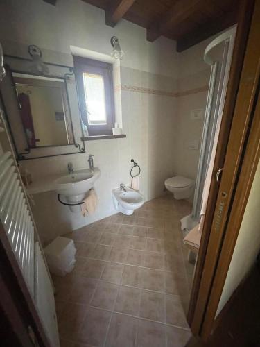 Koupelna v ubytování Hotel Le Petit Abri