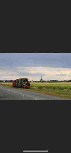 a truck driving down a road on a highway at F2 Rez de Chaussée Ô meublé de Pithiviers in Pithiviers