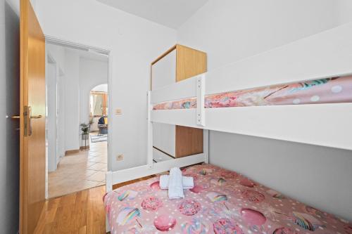 Katil atau katil-katil dalam bilik di Apartment O'live Rabac Istra