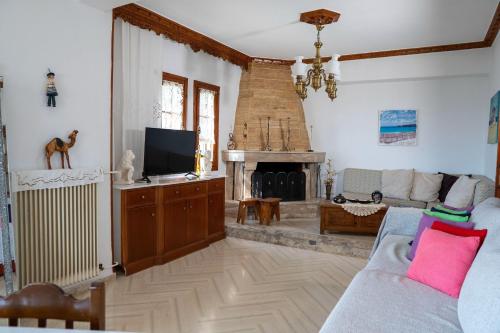 TV a/nebo společenská místnost v ubytování Paradeisos Rooms Pelion