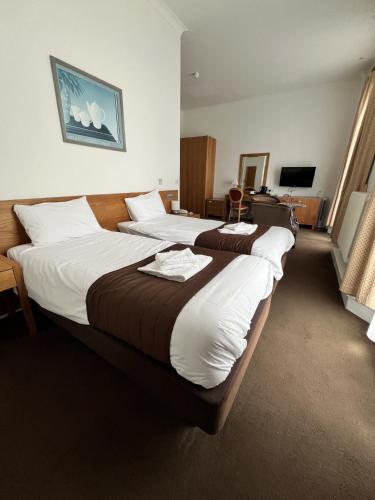 Katil atau katil-katil dalam bilik di Cavendish Hotel