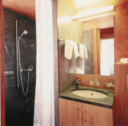Koupelna v ubytování Hotel Alpina