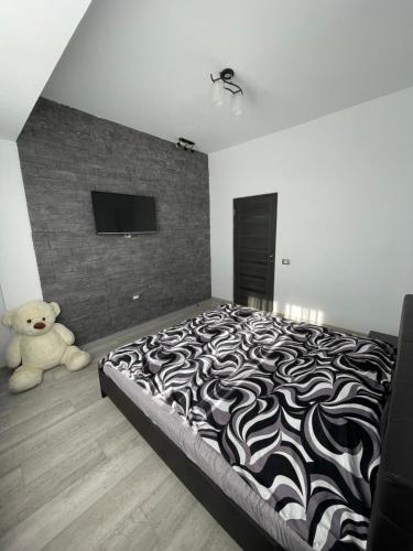 En eller flere senge i et værelse på Apartament Mamaia Nord