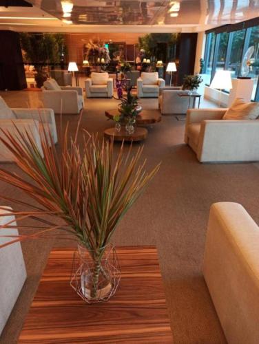 Ruang duduk di Blue Tree Premium Alphaville