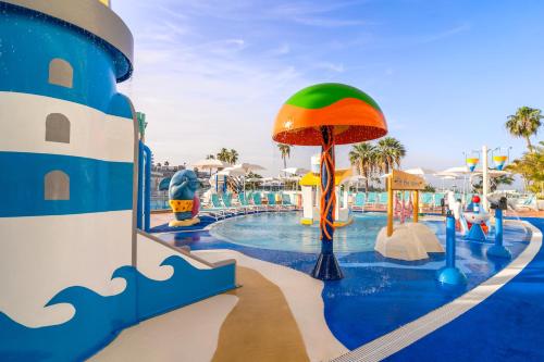 a pool at a resort with a theme park at HOVIMA La Pinta Beachfront Family Hotel in Adeje