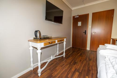 Postel nebo postele na pokoji v ubytování BG4 Guesthouse