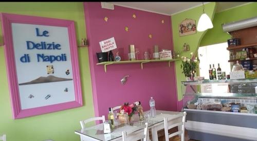 a dining room with a table and a restaurant at Valery AffittaCamere in Capannori