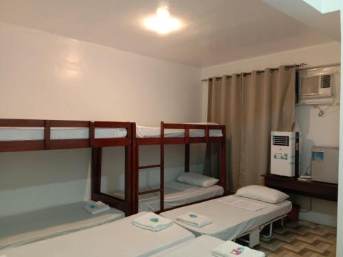 Postel nebo postele na pokoji v ubytování JCV Rooms