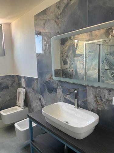 Ένα μπάνιο στο Relais Villa Bonifacio