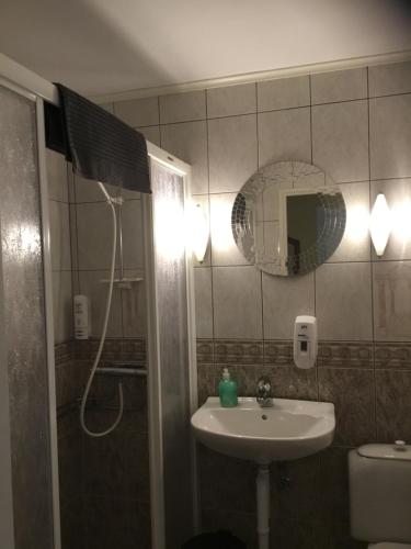 Koupelna v ubytování Staby Gårdshotell