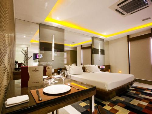 Posezení v ubytování Corinto Hotel