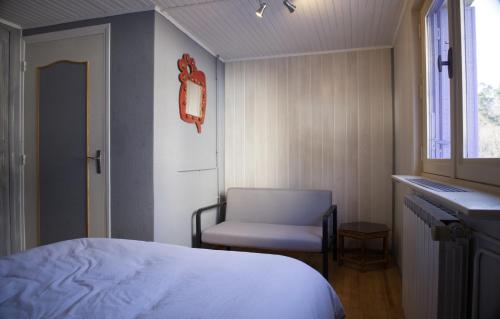 Postel nebo postele na pokoji v ubytování Entre Auvergne et Provence