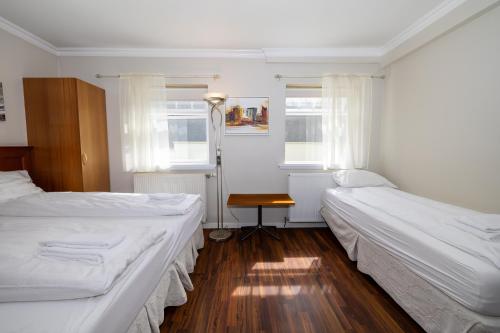 Postel nebo postele na pokoji v ubytování BG4 Guesthouse