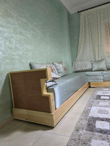 Postel nebo postele na pokoji v ubytování Appartement à louer wadie