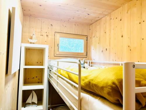 Postel nebo postele na pokoji v ubytování Stella's Holzchalet