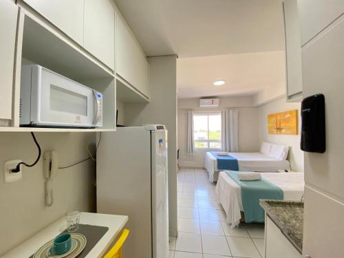 Ένα μπάνιο στο Flat com Wifi, Pisicina e Estacionamento
