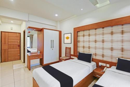カンヌールにあるHotel O AURA RESIDENCYのギャラリーの写真