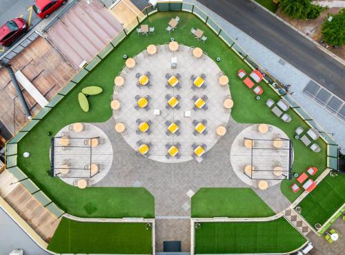 an overhead view of a patio with tables and chairs at HOVIMA Santa María in Adeje