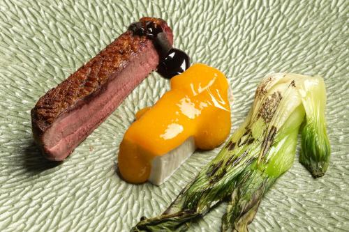 three different types of food on a plate at Relais Villa D'Amelia in Benevello
