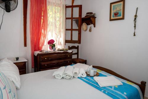 Voodi või voodid majutusasutuse Paradeisos Studio with Garden View toas