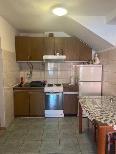 Η κουζίνα ή μικρή κουζίνα στο Apartments Bicanic