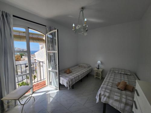 A bed or beds in a room at Los Almendros