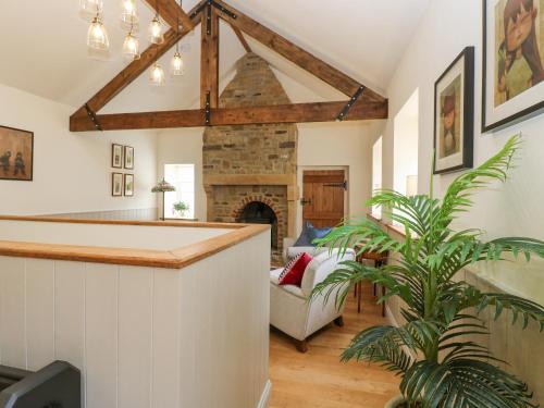 Postel nebo postele na pokoji v ubytování Jack's Cottage