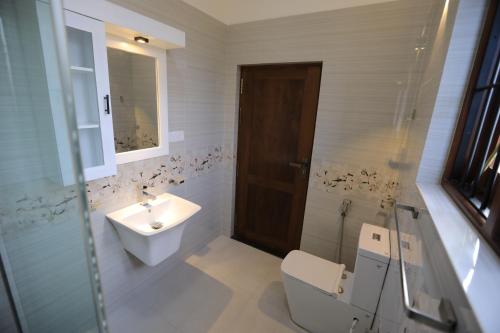 Ein Badezimmer in der Unterkunft d marit Motel