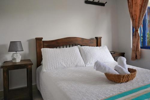 Cama o camas de una habitación en Hospedaje Mirador La Aurora Filandia