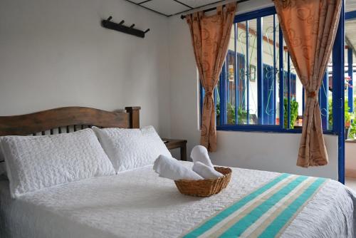 Cama o camas de una habitación en Hospedaje Mirador La Aurora Filandia