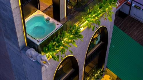 an overhead view of a bath tub in a building at Primavera Luxury Apartments Medellin in Medellín