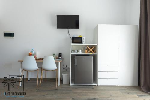 Dapur atau dapur kecil di Lola Suite Lajares iRent Fuerteventura