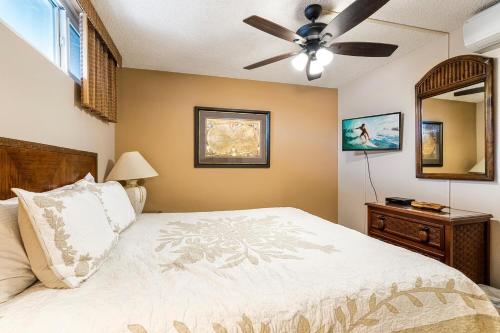 En eller flere senge i et værelse på Kona Reef#D26