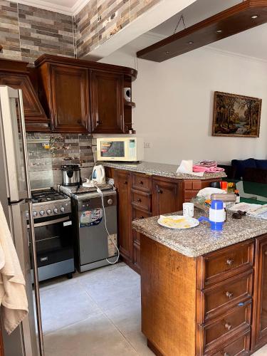 Kuchyň nebo kuchyňský kout v ubytování Karawan chalet