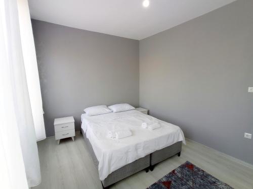 Кровать или кровати в номере Sweet Hotel In Historical Area