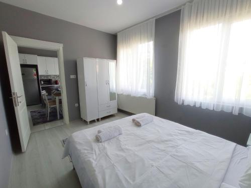 Кровать или кровати в номере Sweet Hotel In Historical Area