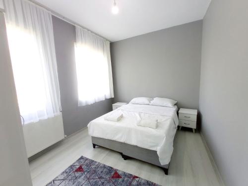 Кровать или кровати в номере Sweet Hotel In Historical Area