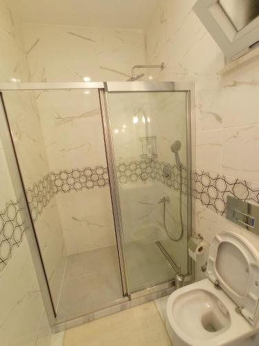 Ванная комната в Sweet Hotel In Historical Area