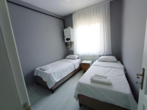 Кровать или кровати в номере Sweet Hotel In Historical Area