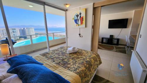 En eller flere senge i et værelse på Resort Urbano Laguna del Mar