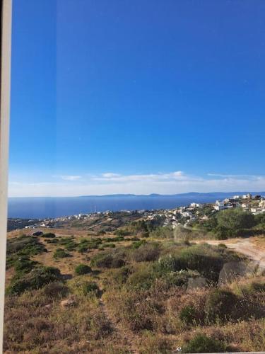 a view of the ocean from the top of a hill at Tanger, Vue Mer Panoramique in Noûnouech