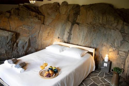 En eller flere senge i et værelse på Telhados de Xisto