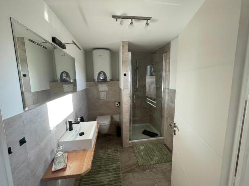 Koupelna v ubytování Bungalow am Wreecher See