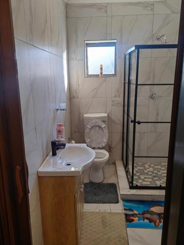 Ένα μπάνιο στο Choosers Express Boutique Hotel Room 3