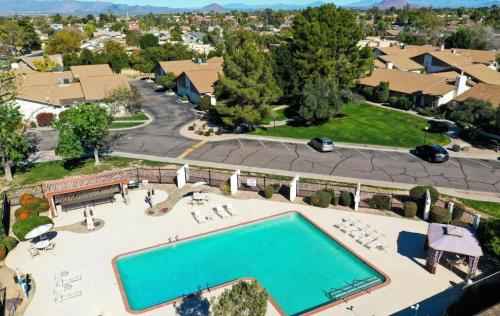 an overhead view of a swimming pool at a resort at Entire Cozy Home With Pool in Mesa