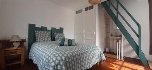 Postel nebo postele na pokoji v ubytování L'Escapade Tréportaise