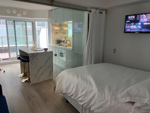 Letto o letti in una camera di Yorkville Terrace