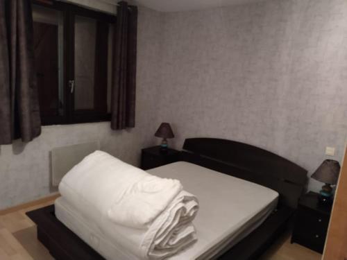 Ένα ή περισσότερα κρεβάτια σε δωμάτιο στο Petit T3 cosy